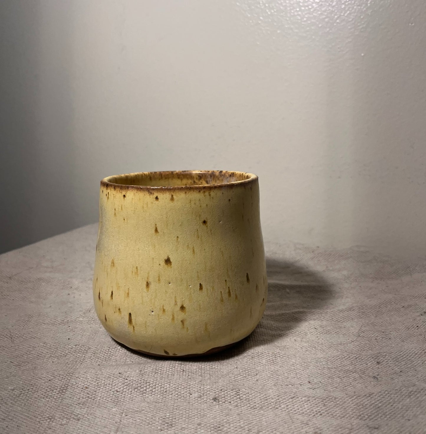 wide short yellow vase