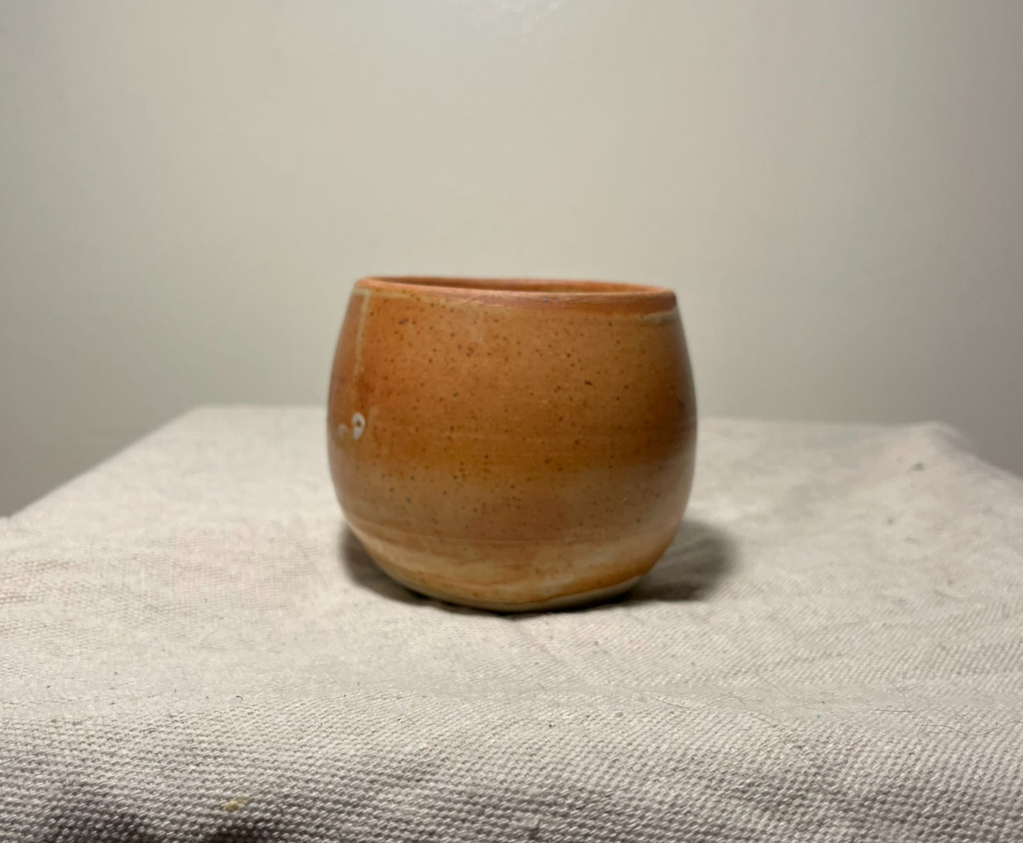 wide orange vase