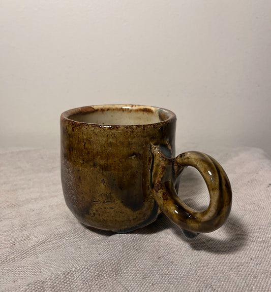 small tan & green loop handle mug