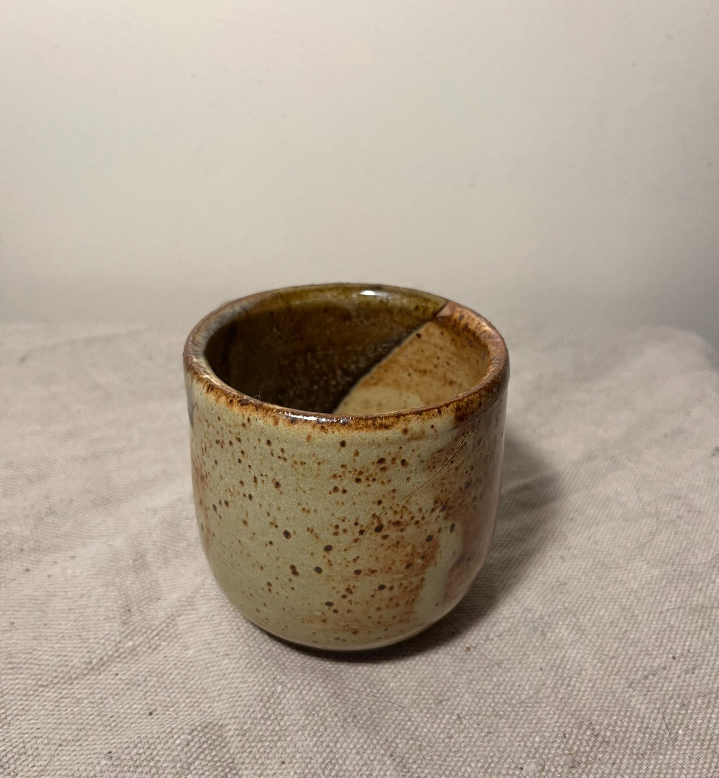 small tan & green loop handle mug