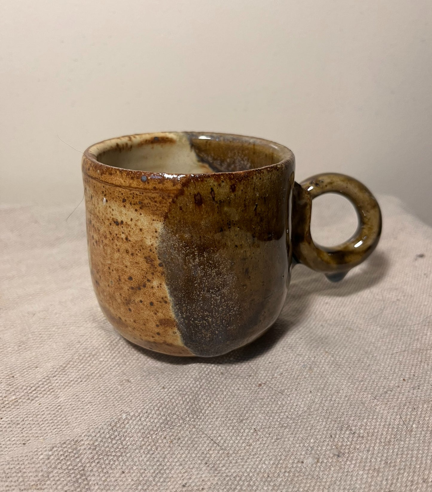 small tan & green loop handle mug