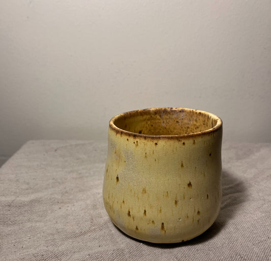 wide short yellow vase